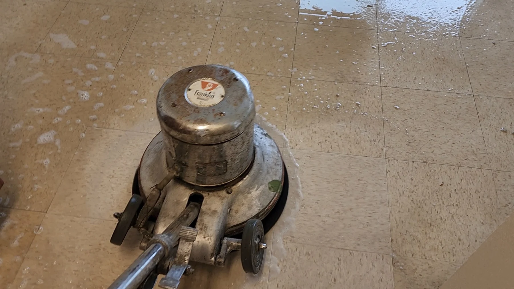Franklin floor cleaning machine on wet cork tile flooring